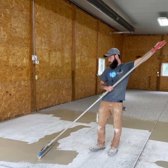 A garage floor project in progress for Select Coatings